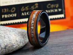 The Bambi | Black Ceramic Ring with Deer Antler and Whiskey Barrel Wood Inlay